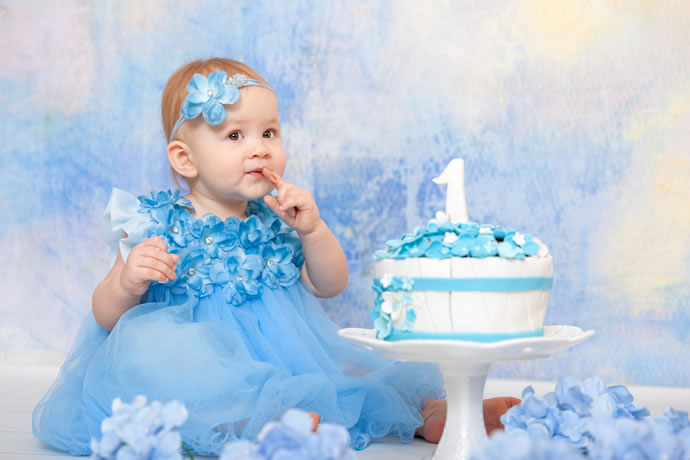 Ensaio fotográfico de bebê com bolo